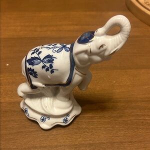 Vintage Blue & White Porcelain Elephant Good Luck Figurine. Has gold accents.
